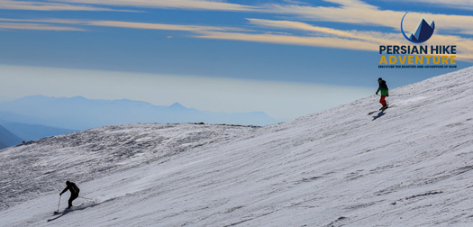 IRAN TOURS 3 The image of several skiers skiing at the Dezin International slop in Iran