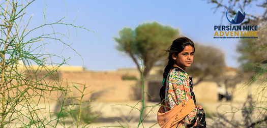 IRAN TOURS 2 The picture of a Baloch girl located in Chabahar port, Sistan and Baluchistan province, Iran
